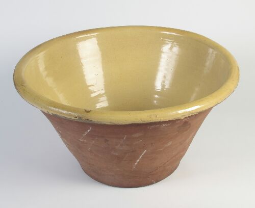 Appraisal: A large th century earthenware cream bowl of tapering cylindrical