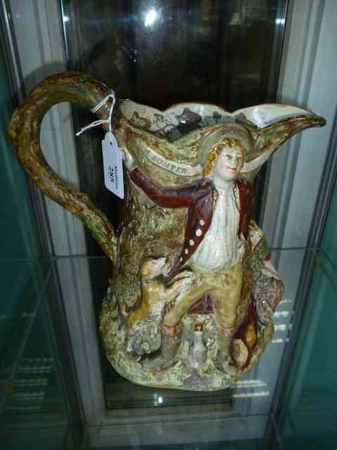 Appraisal: A TH CENTURY PEARLWARE AND ENAMEL DECORATED JUG decorated with