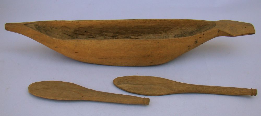 Appraisal: AFRICAN WOODEN MODEL OF A CANOE Late th CenturyWith two