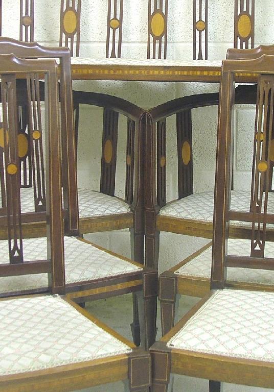 Appraisal: Edwardian mahogany inlaid salon suite with pierced vertical splats inset