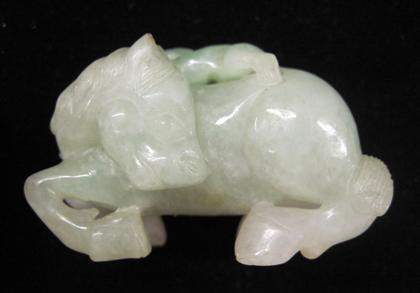 Appraisal: Chinese mottled apple green jade horse form snuff bottle The