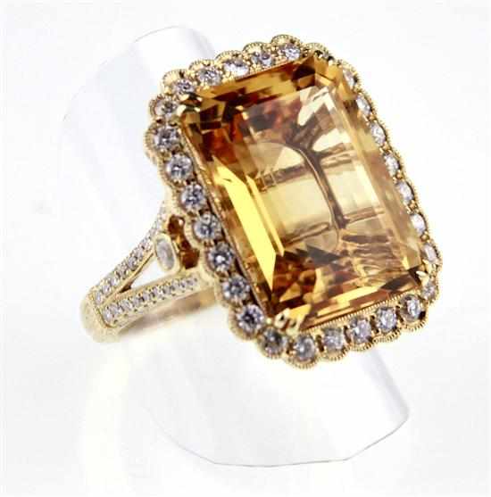 Appraisal: Citrine and diamond ring ct emerald-cut citrine flanked by approx