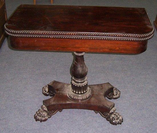 Appraisal: A Regency rosewood card table the hinged lid with beaded