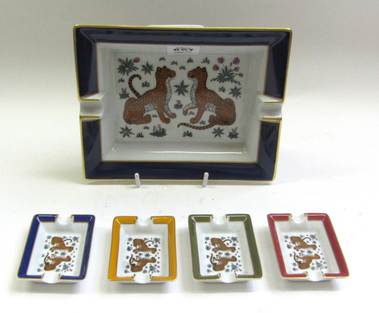 Appraisal: A Hermes porcelain ashtray decorated with two leopards within a