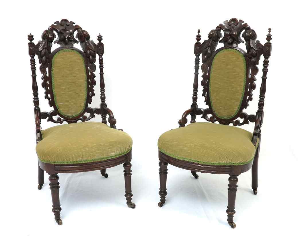 Appraisal: PAIR VICTORIAN CARVED PARLOR CHAIRS Carved foliate and fruit motif