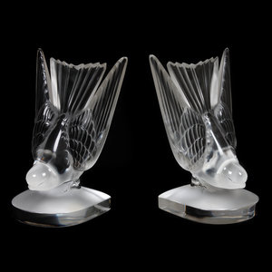 Appraisal: A Pair of Lalique Deux Hirondelles Molded Glass Bookends Height