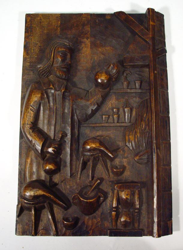 Appraisal: Rectangular carved wooden plaque depicting a chemist cm x cm