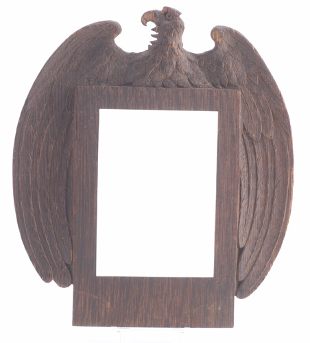 Appraisal: CHARLES ROHLFS Eagle-shaped rustic picture frame Some losses to beak