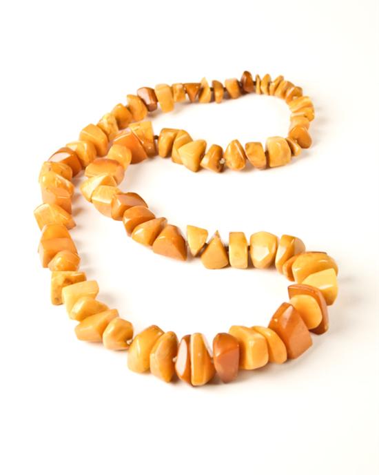 Appraisal: A Graduated Amber Chunk Necklace long