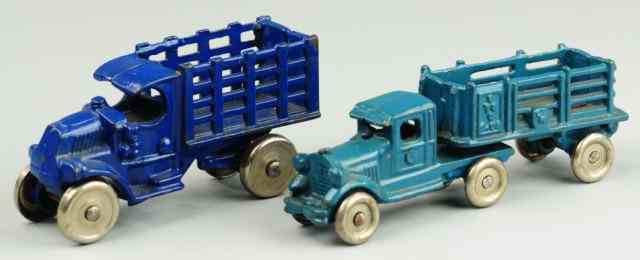 Appraisal: A C WILLIAMS TRUCKS Both cast iron and painted in