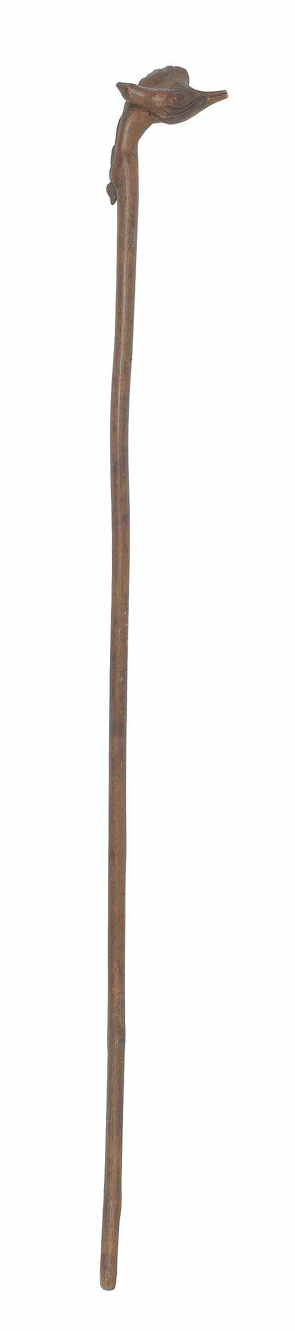 Appraisal: Carved walking stick with an alligator grip l together with