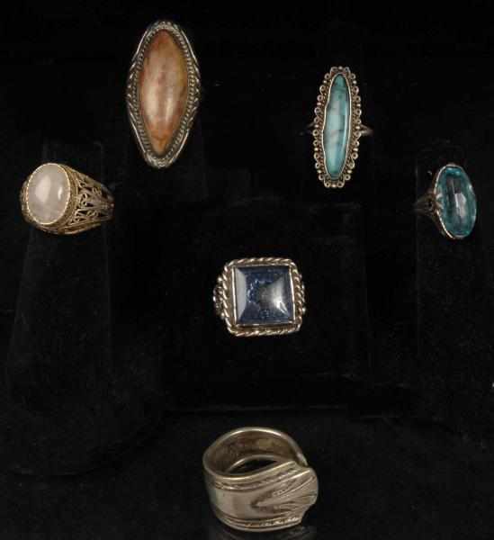 Appraisal: Lot of Sterling Rings Description Includes three with clear polished