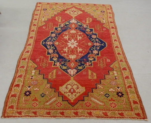 Appraisal: Turkish oriental center hall carpet red field blue and red