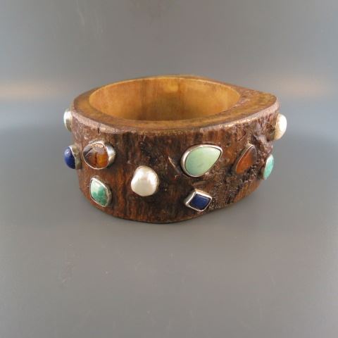 Appraisal: Gemstone Bangle Bracelet a variety of stones in sterling silver