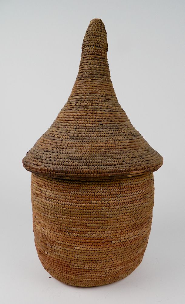 Appraisal: Tutsi basket Tutsi basket Finely woven peaked lidded baskets ibeseki