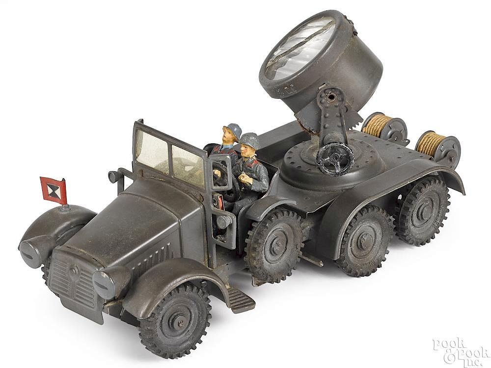 Appraisal: Hausser painted tin clockwork search light truck Hausser painted tin