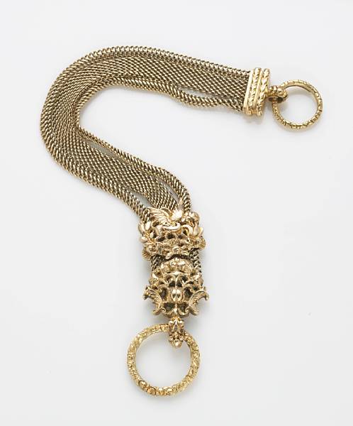 Appraisal: A k gold fob chain decorated with embossed dragons and