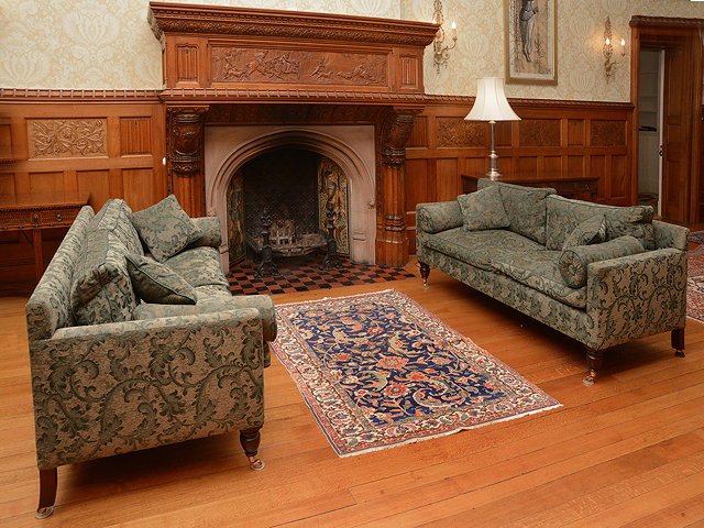 Appraisal: A PAIR OF REGENCY STYLE SOFAS the turned tapering front