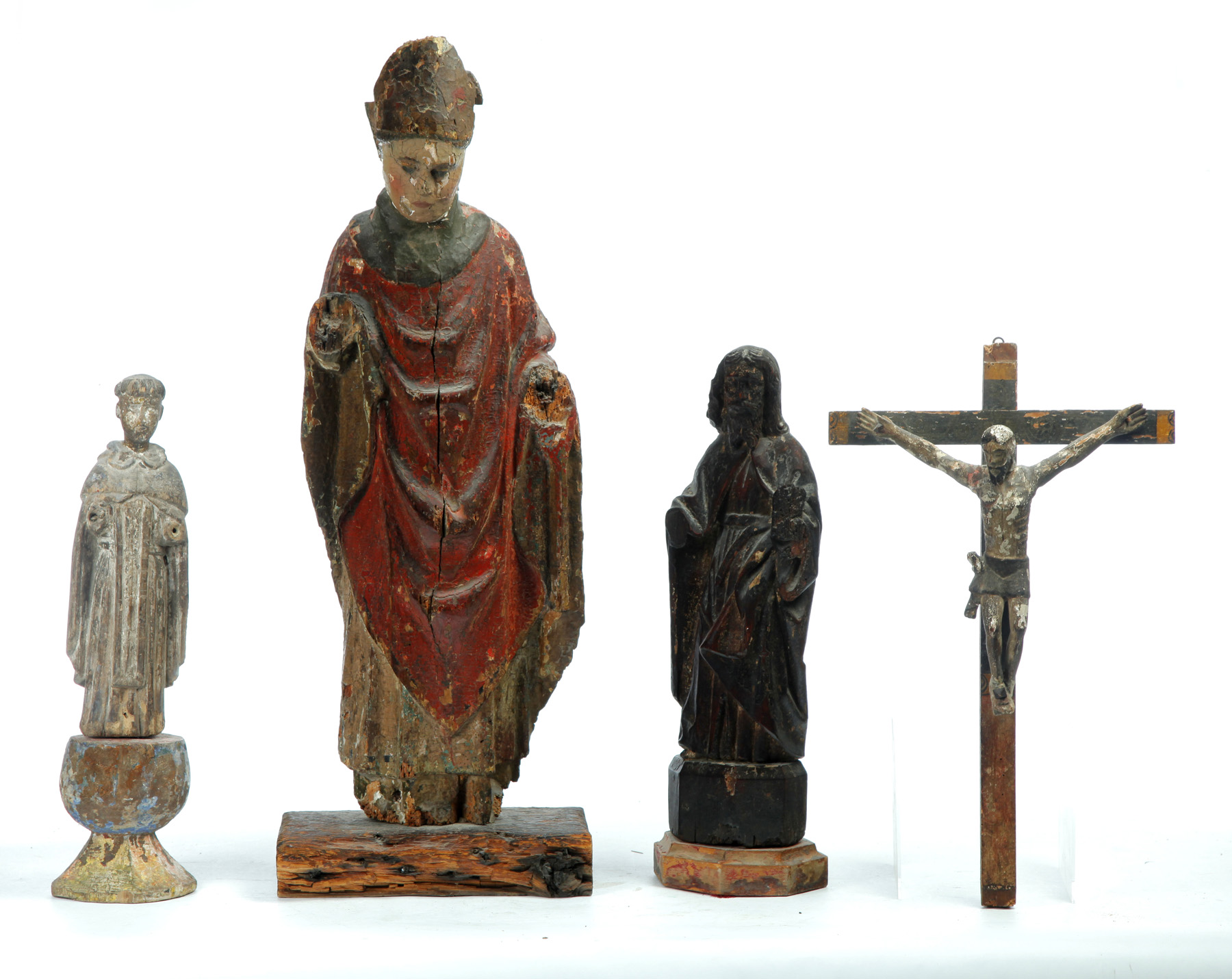 Appraisal: THREE SANTOS AND A CRUCIFIX Probably South or Central America