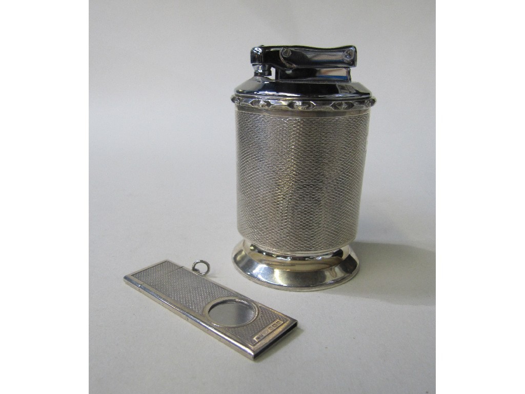 Appraisal: Lot comprising silver cigarette lighter and a silver cigarette cutter