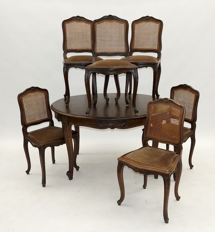 Appraisal: French Country Fruitwood Rococo Chairs Table Set France th Century