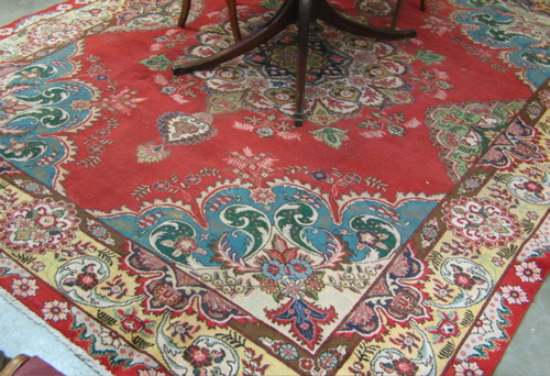 Appraisal: PERSIAN TABRIZ CARPET northwestern province of Azerbaijan the rug with