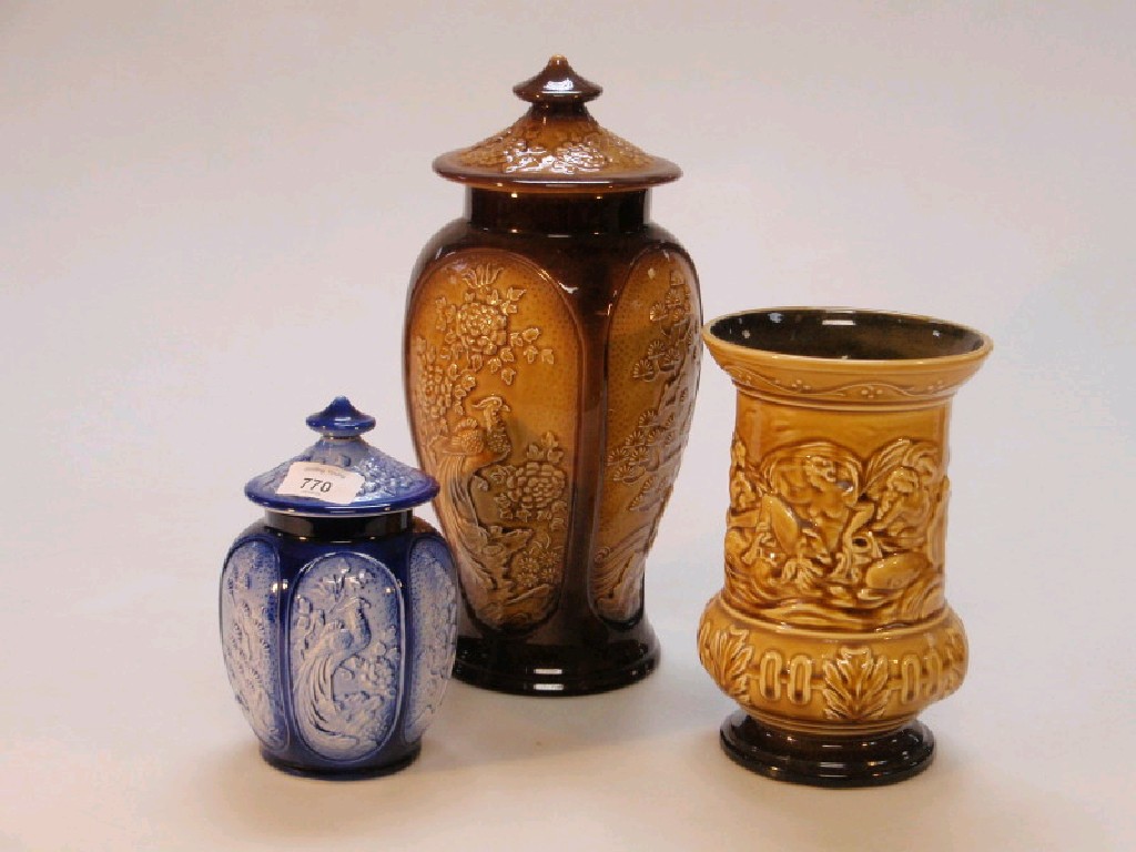 Appraisal: Sylvac blue embossed lidded jar and two vases