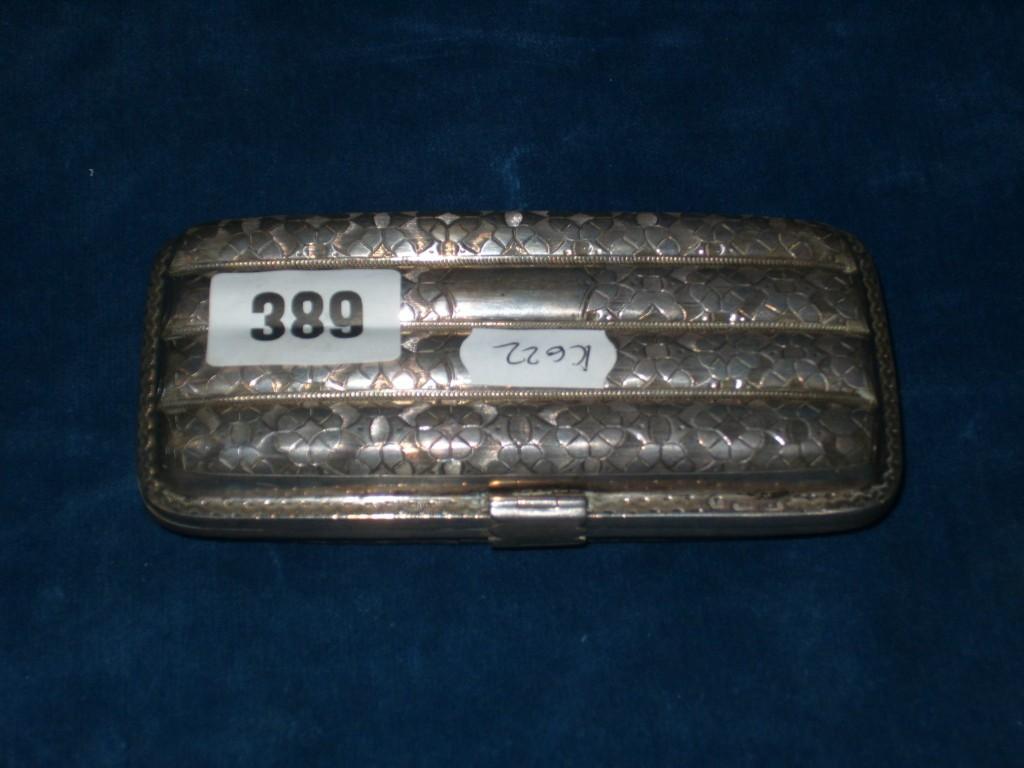 Appraisal: A Victorian silver -divisional cigar case with engraved decoration with