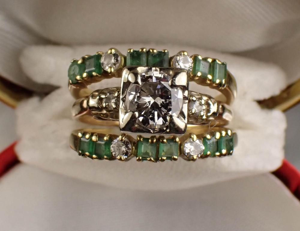 Appraisal: DIAMOND EMERALD AND FOURTEEN KARAT GOLD RING made up of