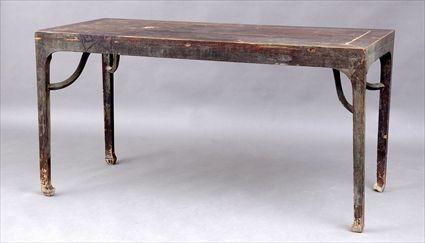 Appraisal: CHINESE RED-STAINED ELM CENTER TABLE The rectangular top on angular