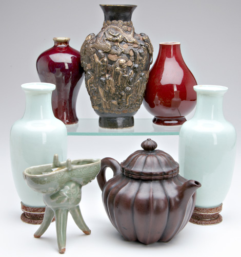 Appraisal: CHINESE PORCELAIN Molded porcelain vase imitating bronze molded in high-relief