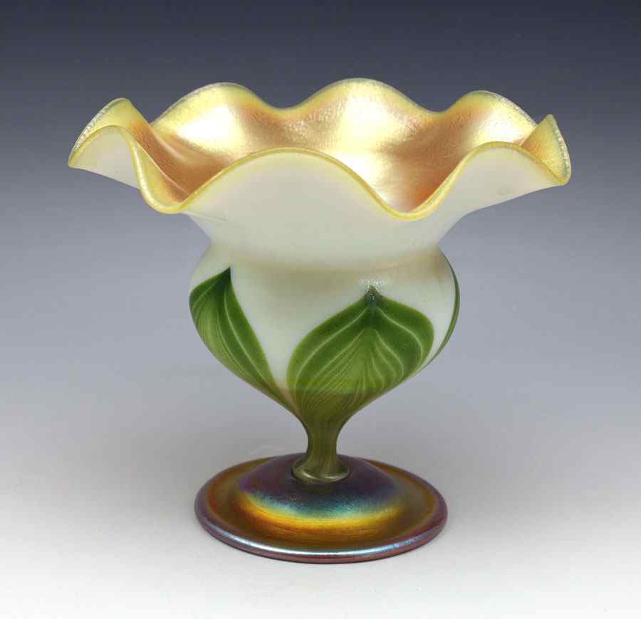 Appraisal: TIFFANY FAVRILE ART GLASS PEDESTAL VASE Floriform with a pulled