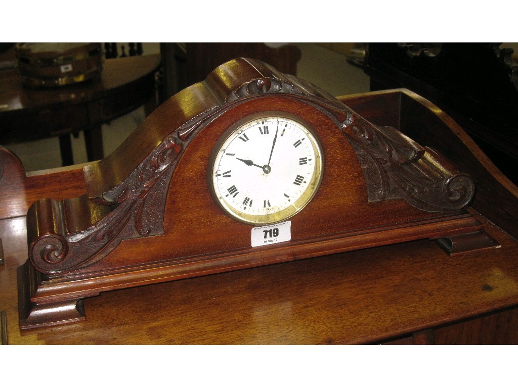 Appraisal: Carved mahogany mantle clock