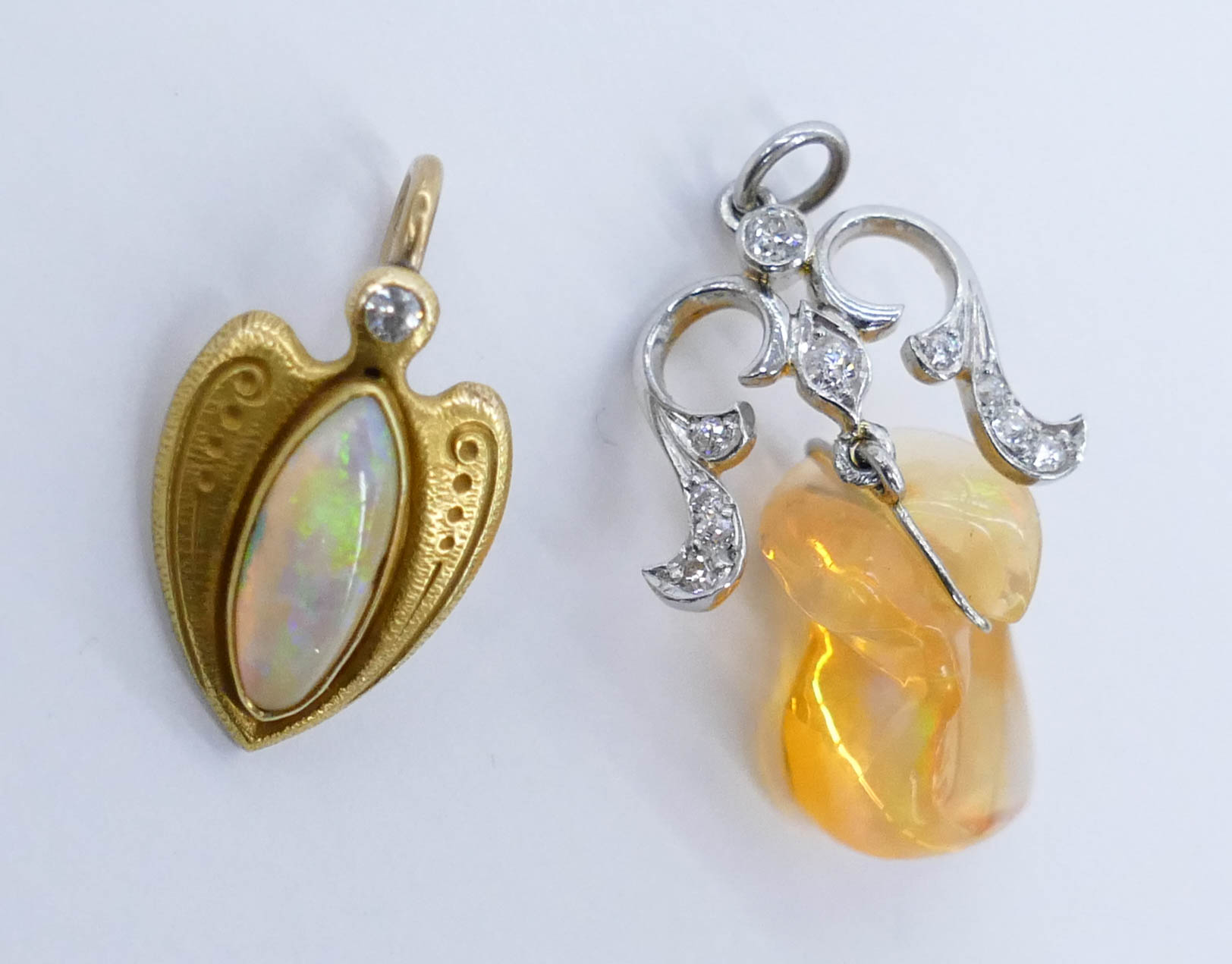 Appraisal: pc Edwardian Diamond Opal Pendants Includes a platinum and k