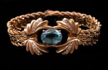 Appraisal: Blue Topaz Diamond Bracelet K yellow gold bracelet has a