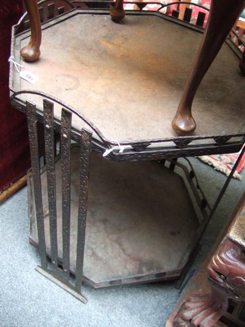 Appraisal: A late th century cast iron octagonal two-tier table in