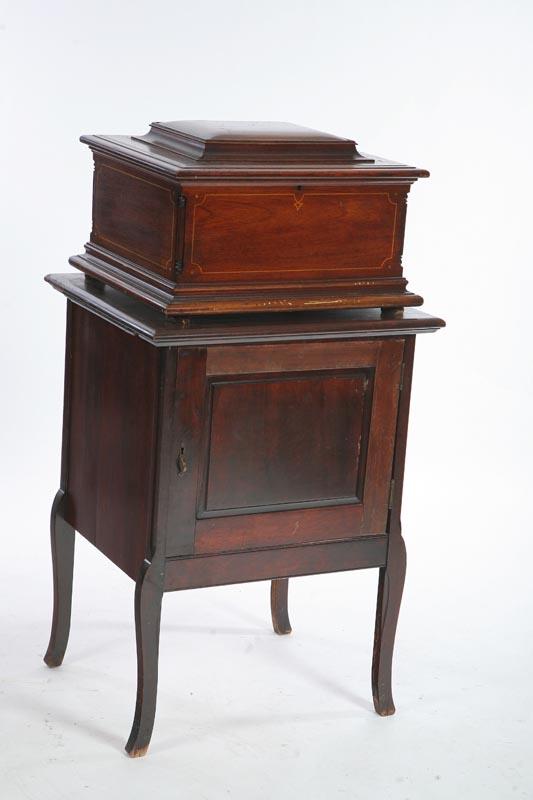 Appraisal: REGINA MUSIC BOX ON STAND Double comb in a mahogany