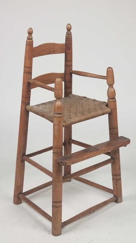 Appraisal: Child's High Chair Child's wood high chair with woven seat