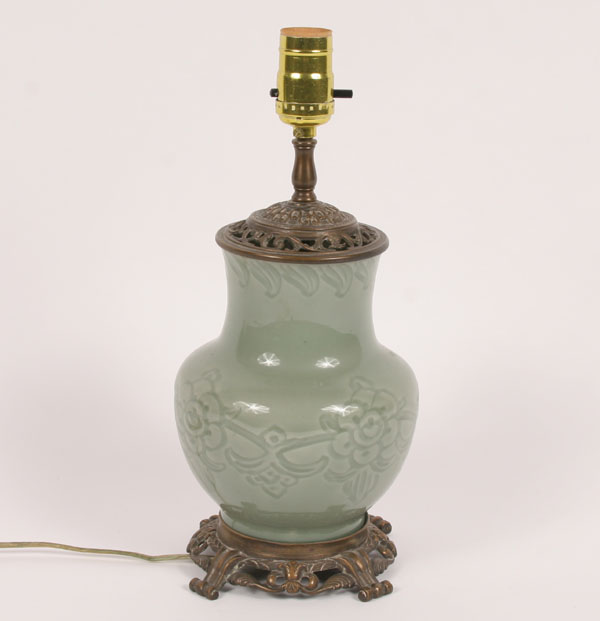 Appraisal: Celadon lamp continuous floral pattern ornate bronze base and cap