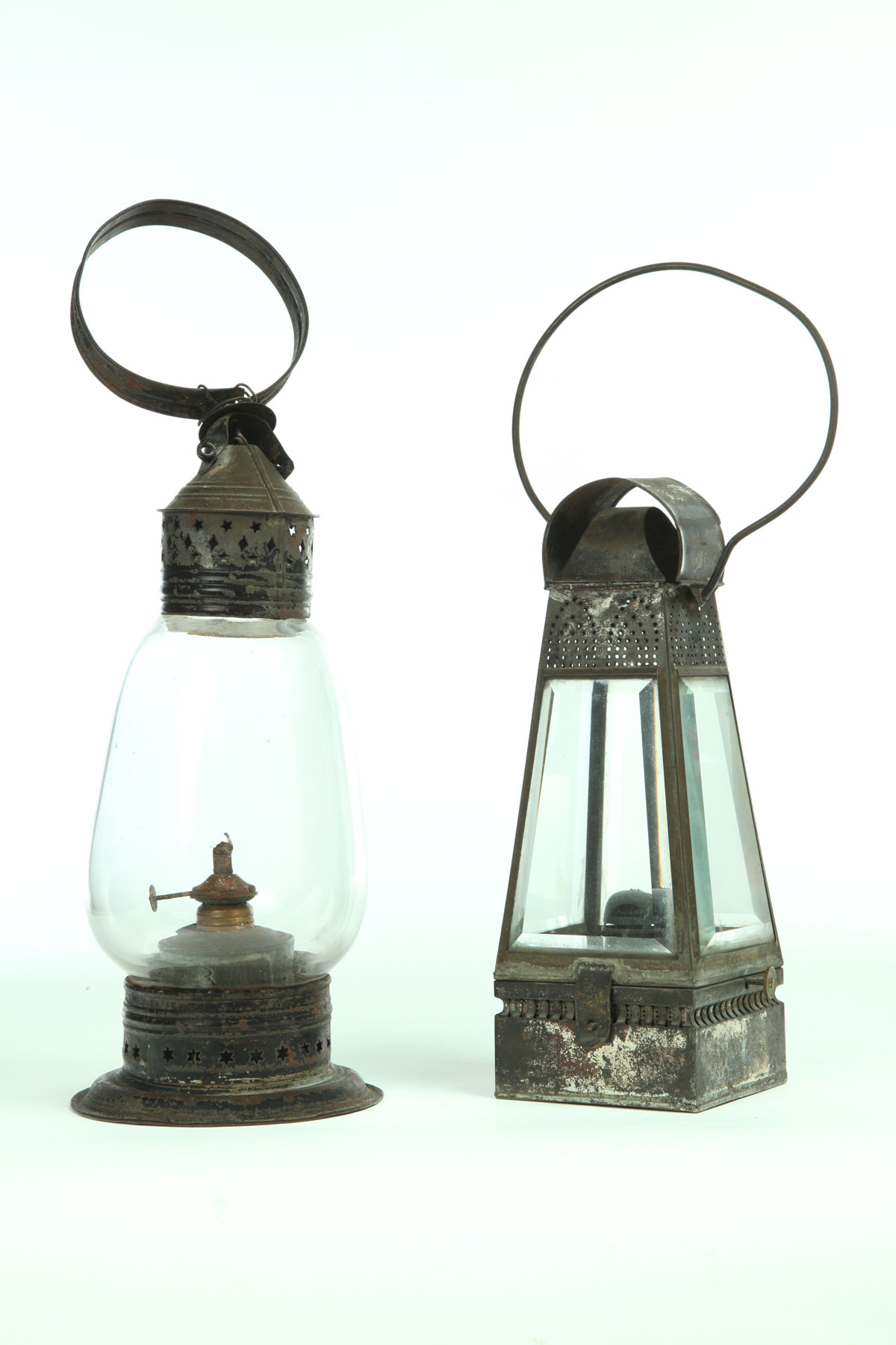 Appraisal: TWO LANTERNS American mid th century tin and glass Oblong