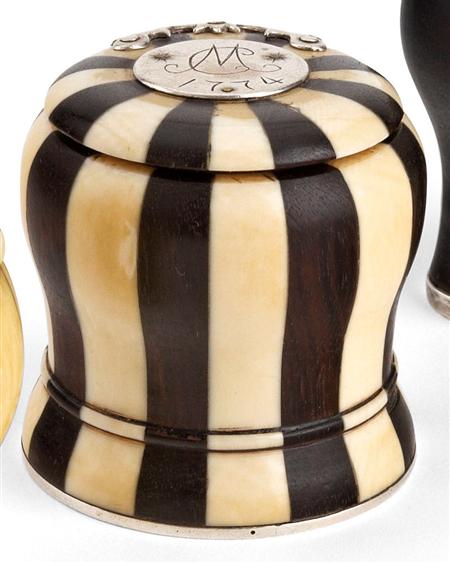 Appraisal: A banded ivory and ebony snuff mull composed of sixteen