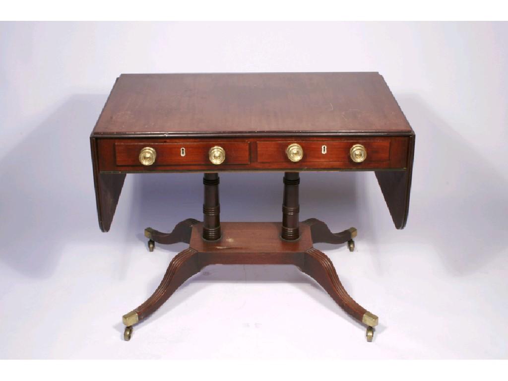 Appraisal: A REGENCY MAHOGANY SOFA TABLE the rectangular top with twin