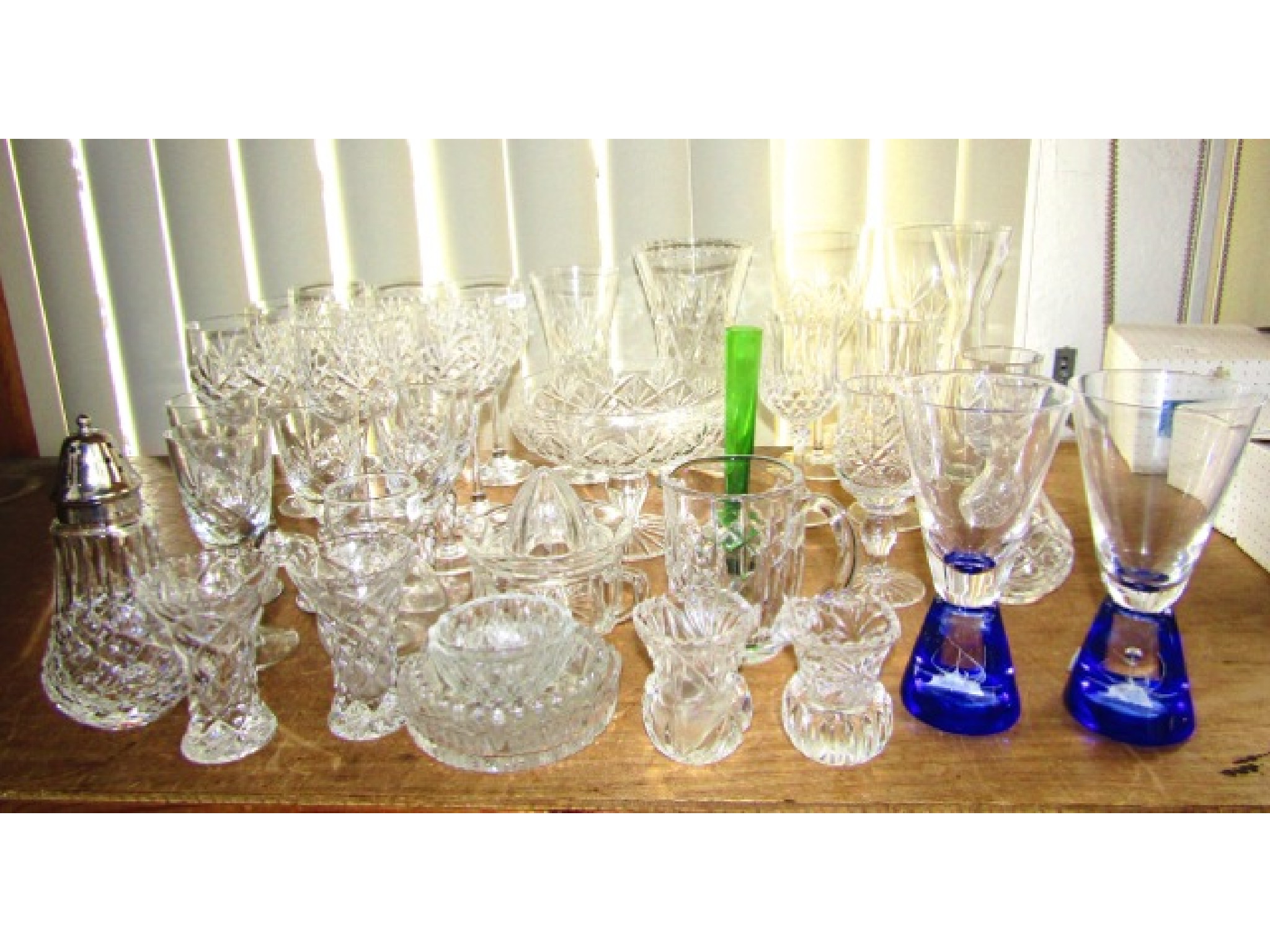 Appraisal: A mixed quantity of various clear cut drinking glasses jugs