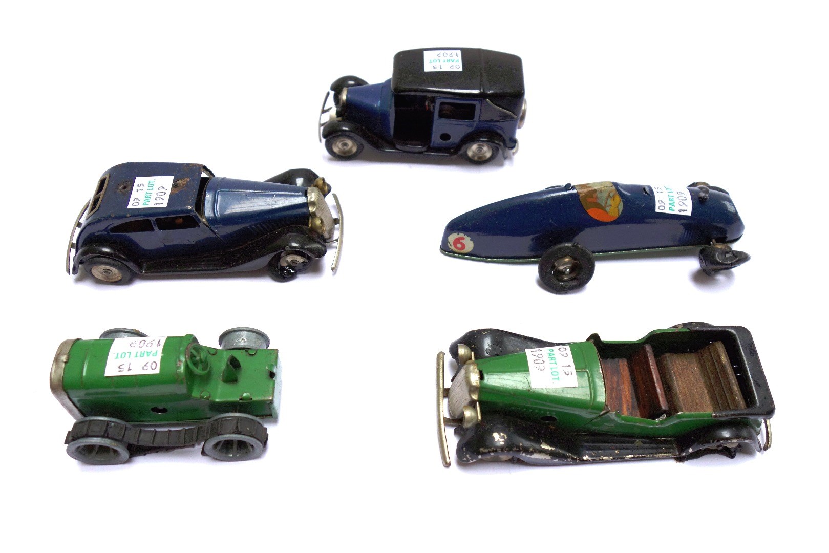 Appraisal: Three Triang Minic clockwork saloon cars a caterpillar tractor and