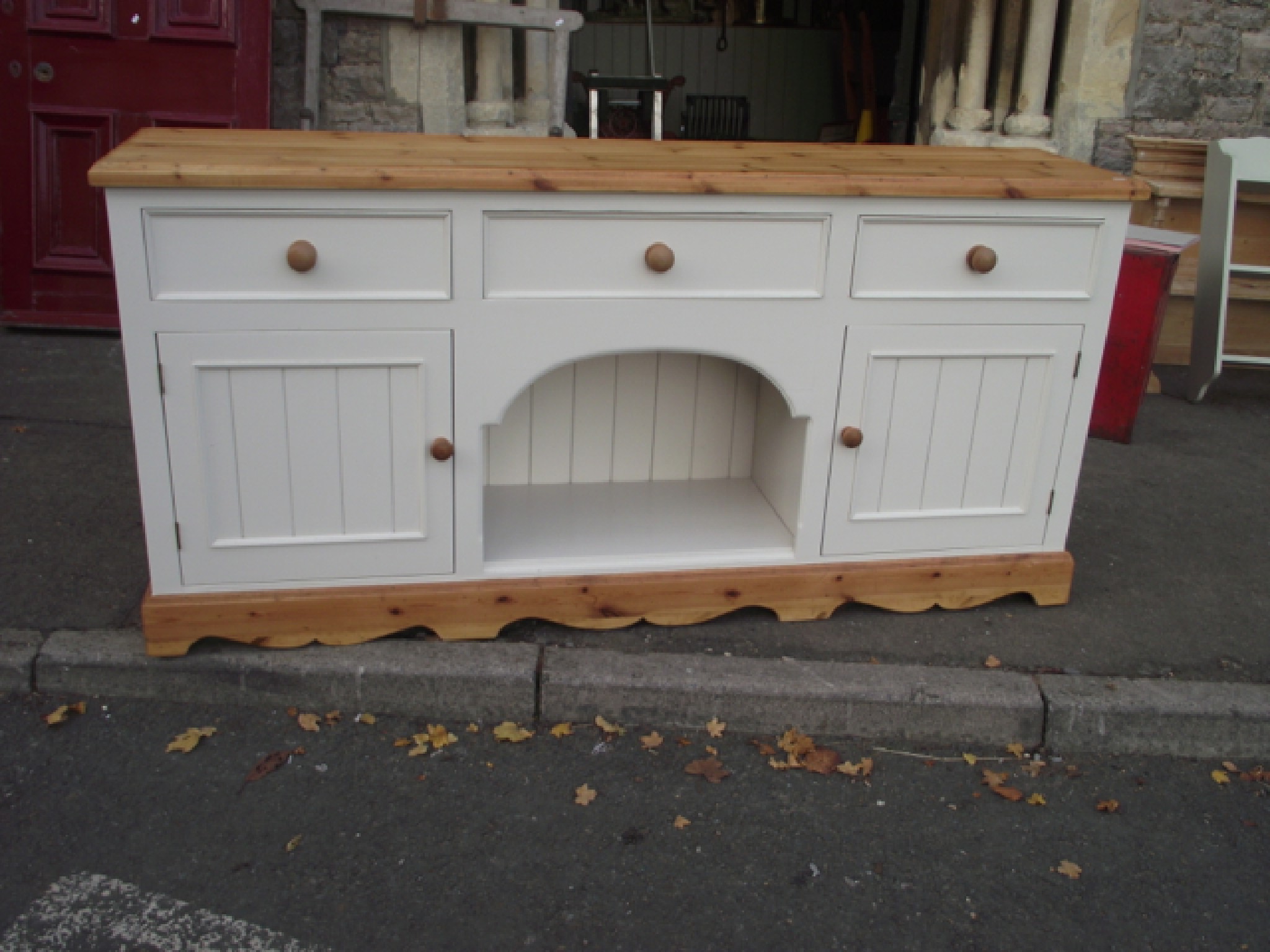 Appraisal: A pine dresser base of dog kennel form the base