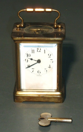 Appraisal: French carriage clock brass and glass with an eleven jewel