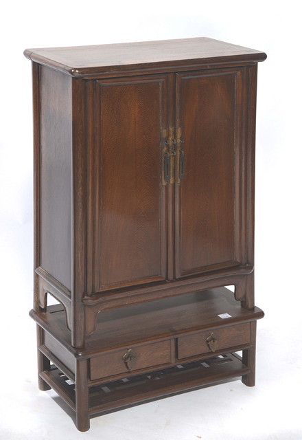 Appraisal: A CHINESE JICHIMU ROUND-CORNER CABINET AND STAND standing on four