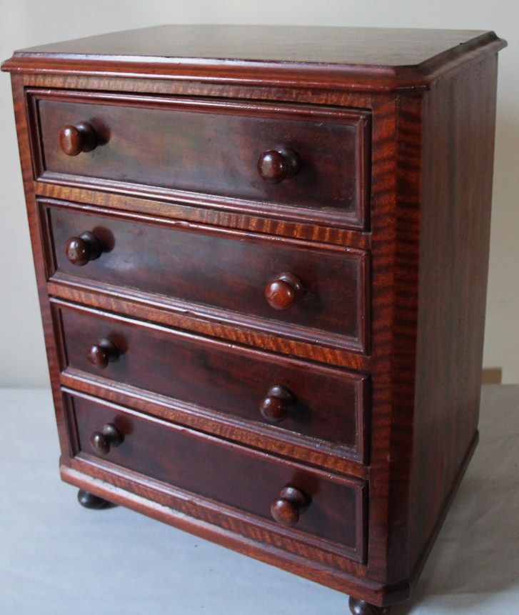 Appraisal: A Victorian mahogany miniature or apprentice chest of four drawers