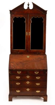 Appraisal: A George III bureau bookcase the broken architectural pediment with