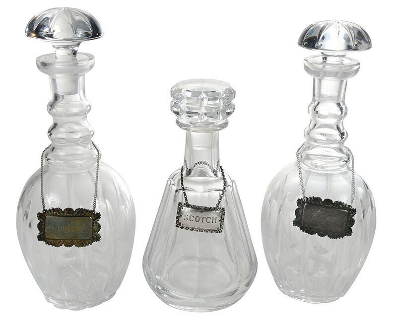 Appraisal: Three Cut Glass Decanters with Tags British French th th